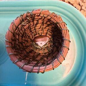 Natural Brown Pine Woven Basket with heart shaped polished rock.